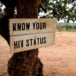 © 2010 Jon Rawlinson. Photo of a sign "Know your HIV status."