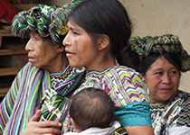 Three women in Guatemala with a baby